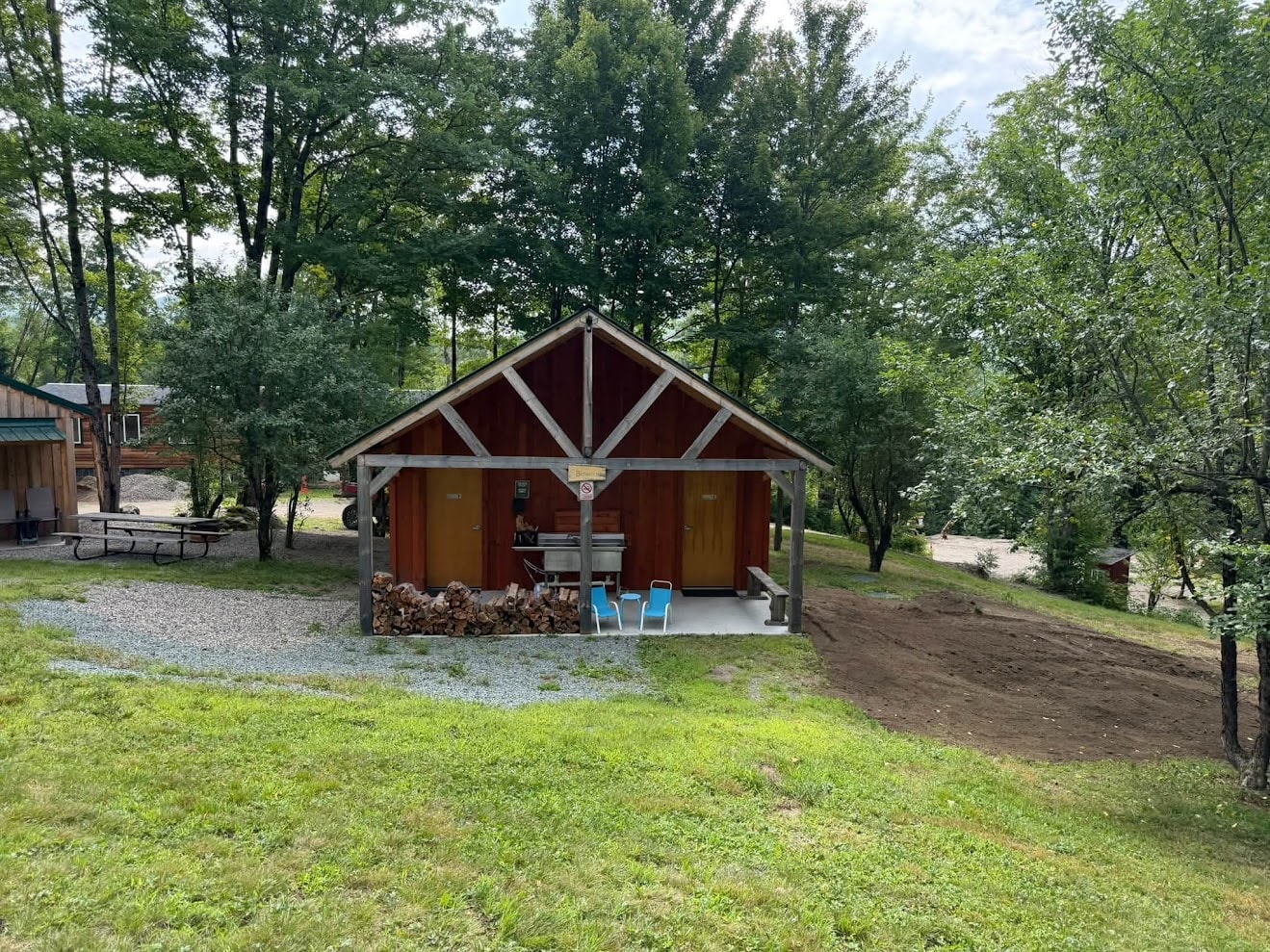 Centralized heated bath house shared by all cabin guests