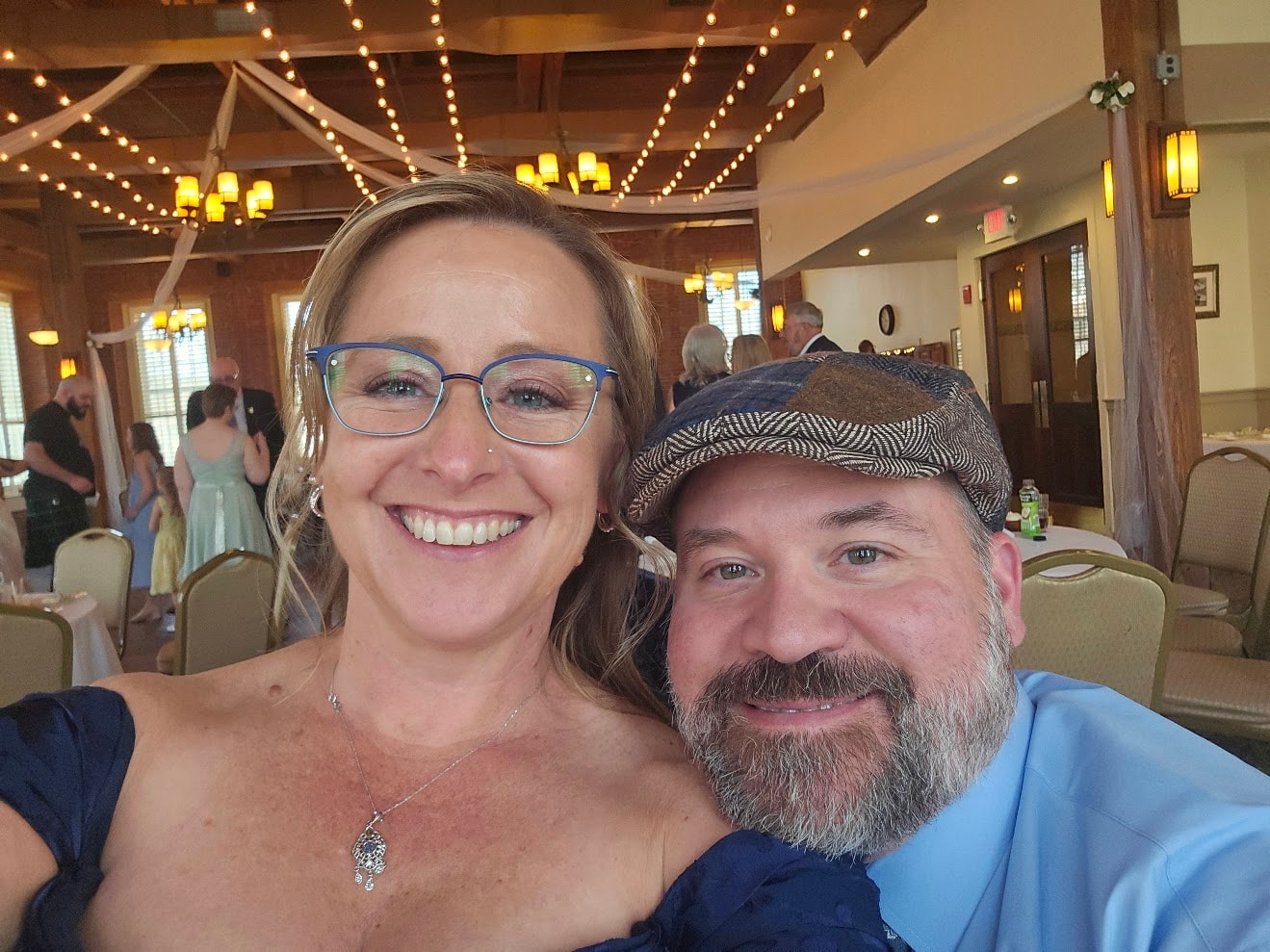 William and Malinda smiling together at a celebration